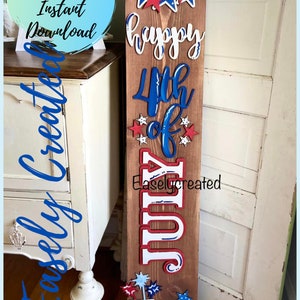 May include: A wooden sign with the words "Happy 4th of July" in blue and red letters. The sign is decorated with stars and fireworks.