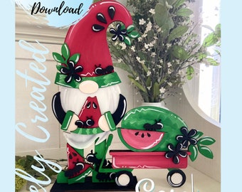 May include: A wooden watermelon gnome holding a slice of watermelon in one hand and pushing a red wagon with a watermelon in it. The gnome is wearing a red hat with black seeds and a green beard. There are black ants on the gnome, wagon, and watermelon. The text "Digital Cut File Instant Download" is in a circle at the top of the image. The text "Easily Created" is at the bottom of the image.