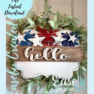May include: A wooden patriotic wreath with red, white, and blue star and firework designs. The word "hello" is displayed on a wooden plank. The text "Digital Cut File Instant Download" is in a blue circle.
