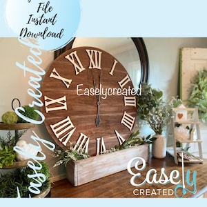 May include: A large, round wooden clock with Roman numerals. The clock face is a dark brown colour, and the numerals are white. The clock hands are black. The clock is part of a home decor theme.