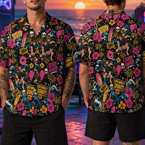 May include: A short-sleeve button-down shirt featuring a black background with a vibrant, repeating graphic print of pink hibiscus flowers, yellow palm trees, blue ocean waves, surfboards, boxing gloves, skulls, and text reading "DONUT PANIC" and "SURF HARD".