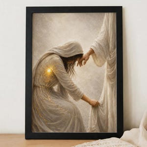 May include: A framed wall art print depicting a kneeling figure in a textured white robe with a glowing golden light emanating from the chest area, reaching out to touch the hem of a standing figure draped in a flowing, long white garment.