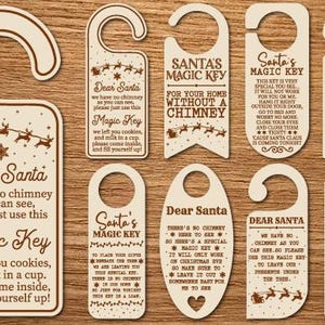 May include: A collection of wooden Christmas door hangers with various designs and text. The designs include Santa's sleigh, reindeer, stars, and the words "Dear Santa" and "Magic Key".
