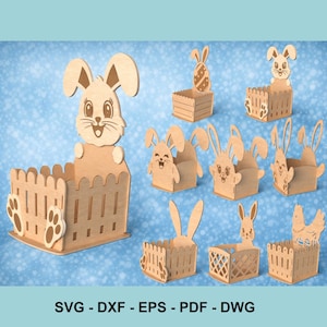 Puede incluir: Una colección de cajas y cestas de madera con temática de Pascua, cada una con un diseño de conejito. Las cajas varían en forma y tamaño, algunas con detalles de vallas y otras con caras y orejas de conejito. Los diseños están cortados con láser.