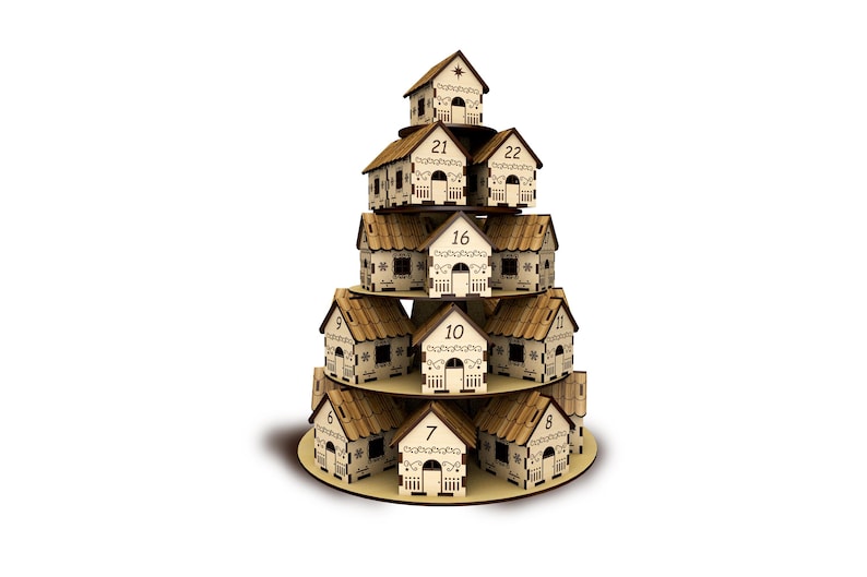 May include: A wooden advent calendar shaped like a tiered Christmas tree. Each small house is numbered and has a door. The houses are arranged in a circular pattern, with the numbers 6, 7, 8, 9, and 10 visible.