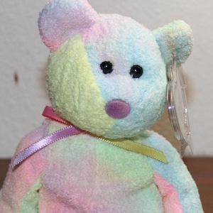 Ty Beanie Babies " Groovy " was Born With Errors in 1999 which makes this Vintage also Retired Bear and highly sought after, All *Mint Cond.