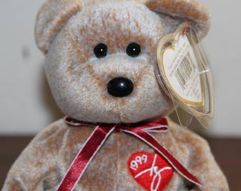 Ty Beanie Baby 1999 Signature Bear Rare w/ Tag Errors / Mint condition / Never Played with. Kept in Acrylic Case.