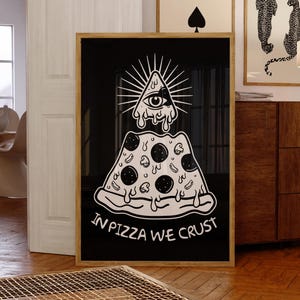May include: Black and white illustration of a pizza with an all-seeing eye on top. The pizza is in the shape of a triangle and has a dripping cheese effect. The text "In Pizza We Crust" is below the pizza.
