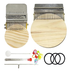 May include: Two wooden circular weaving looms with metal components. Additional tools include a needle, a crochet hook, stitch markers, and three black rubber bands. The looms have a light wood grain pattern.