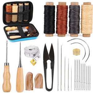 May include: A leathercrafting kit with various tools and supplies. Includes spools of thread in multiple colors, needles, scissors, a tape measure, and a blue zippered case. Also features leather finger protectors and wooden handled tools.