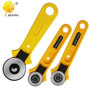 May include: Three yellow rotary cutters with black accents and circular silver blades. The two smaller cutters feature the text Rotary Cutter and 28 mm on the blade. The JIGONG logo is visible in the top left corner of the image.