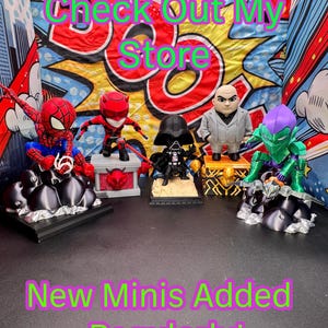 May include: A collection of superhero and villain figurines, including Spider-Man, Daredevil, Darth Vader, and the Green Goblin. The text "Check Out My Store" and "New Minis Added Regularly!" are displayed in the image.