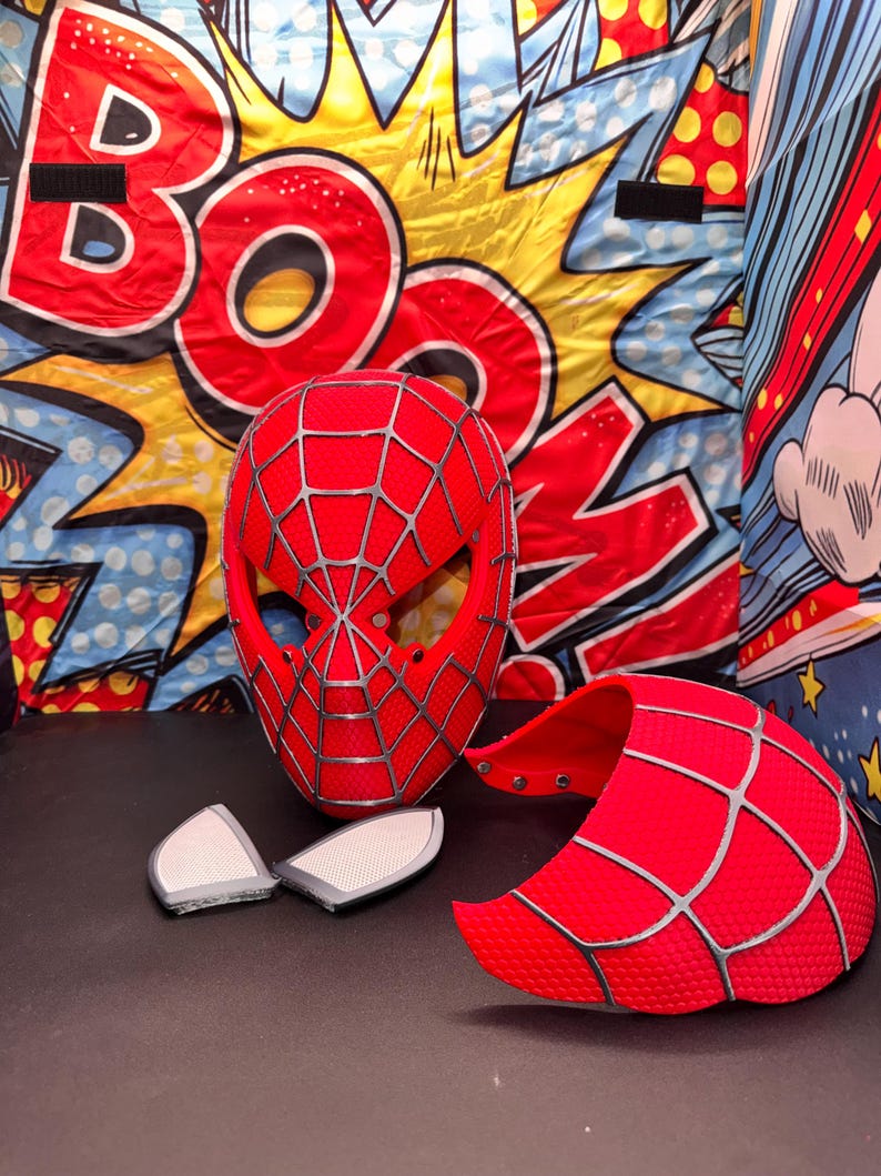 May include: A white ceramic mug with a black handle and the text "But First, Coffee" in a bold, black font. The mug is filled with a dark liquid, likely coffee, and sits on a light-colored surface.