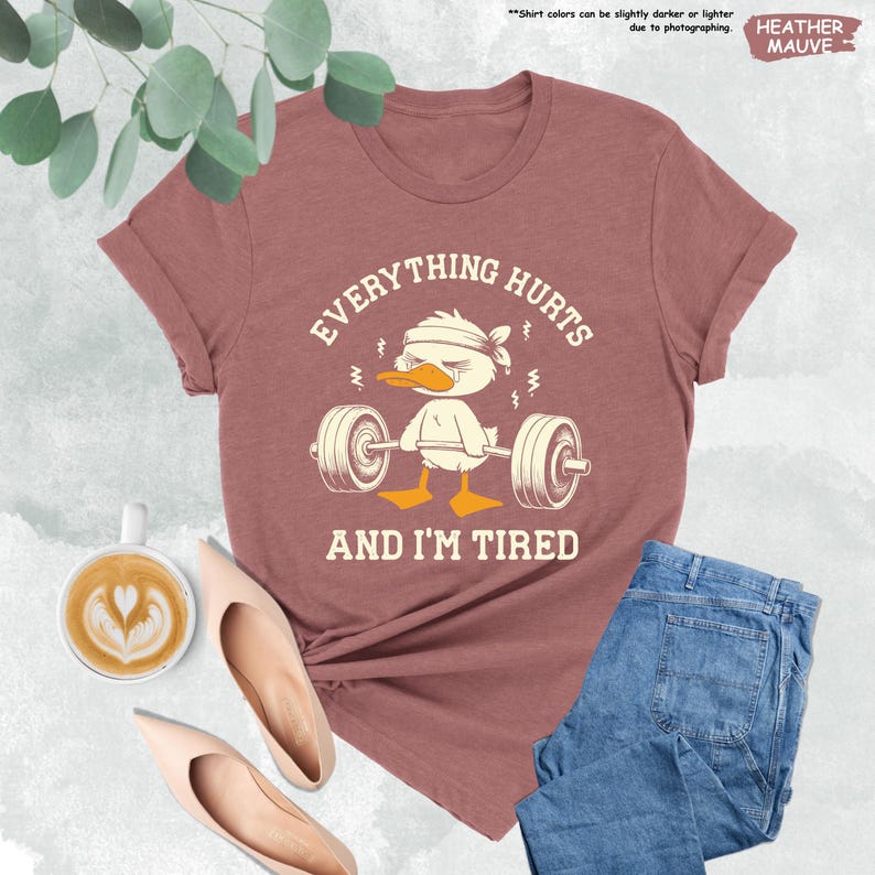 a t - shirt that says everything hurts and i'm tired
