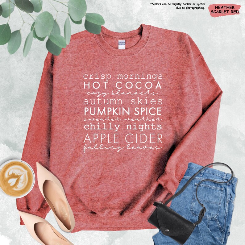 a red sweatshirt with a quote on it