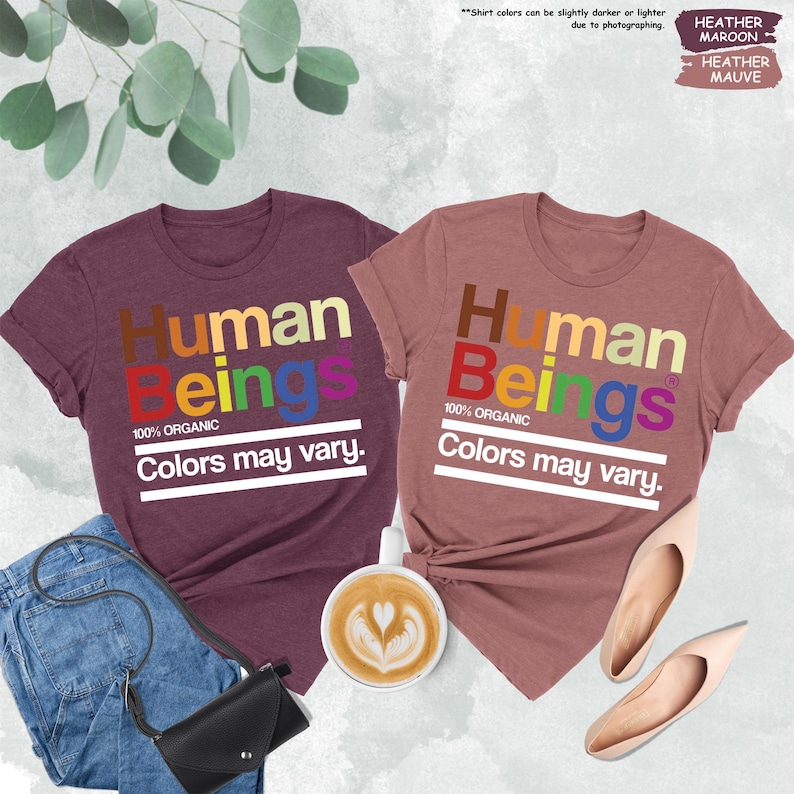 two t - shirts that say human beings and colors may vary