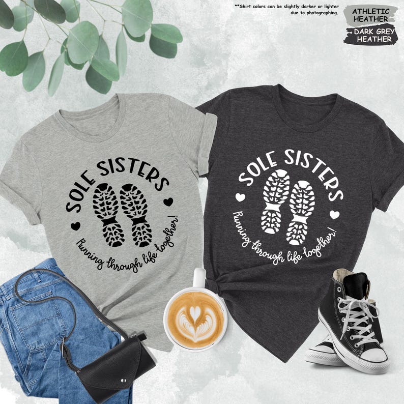 a couple of shirts that are next to a cup of coffee