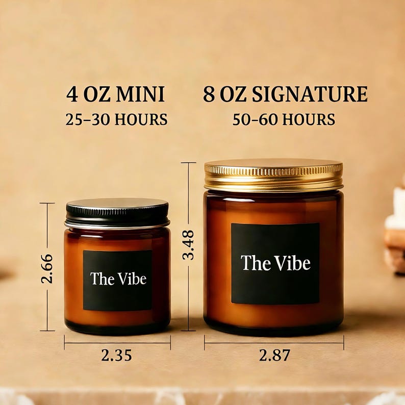 May include: Two glass jar candles with black labels that read "The Vibe." The smaller candle is 2.66 inches tall and 2.35 inches wide, while the larger candle is 3.48 inches tall and 2.87 inches wide. The smaller candle is labeled as 4 oz mini and the larger candle is labeled as 8 oz signature.