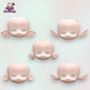 May include: Five blank doll heads with various wing-like ear designs. The heads are a pale pink color and have oval eye and mouth openings. The logo "KawaiiForge" is in the upper left corner.