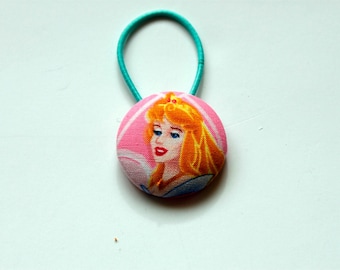 Sleeping Beauty Fabric Covered Giant Button Ponytail Holder
