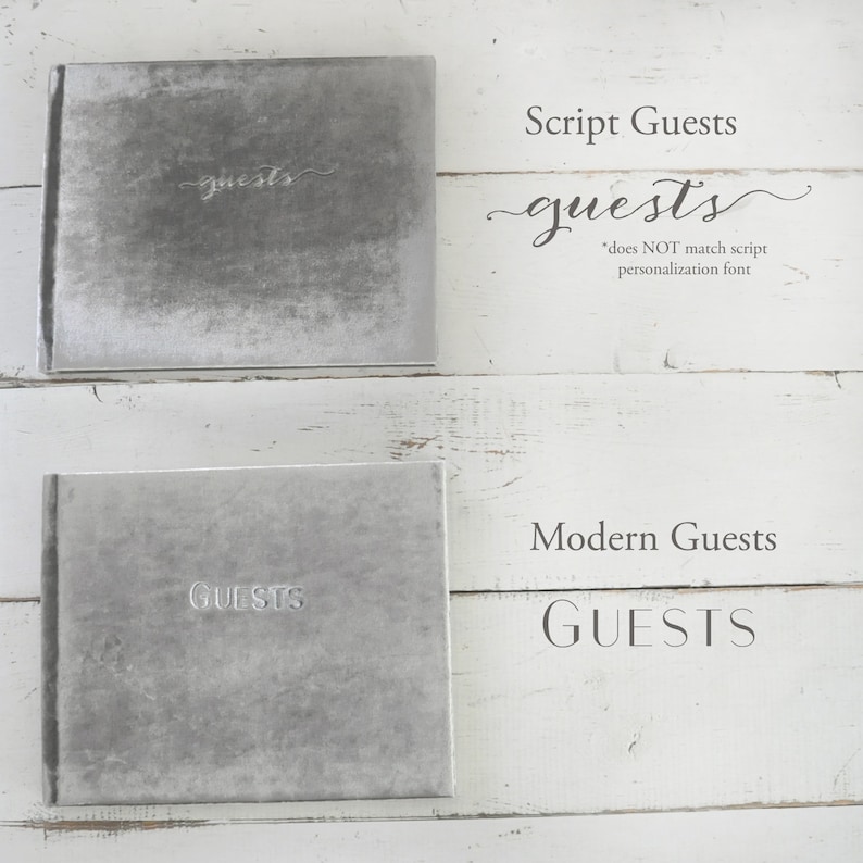 May include: Two gray velvet guest books with different lettering styles. The top book has the word "guests" written in a script font. The bottom book has the word "GUESTS" written in a modern font.