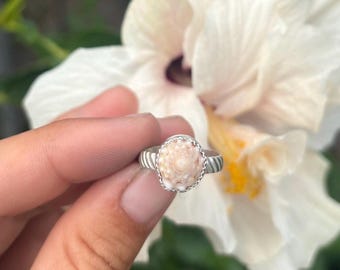 Cone shell topper ring