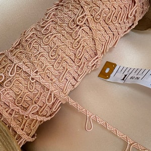 Button loop trim in pink color
