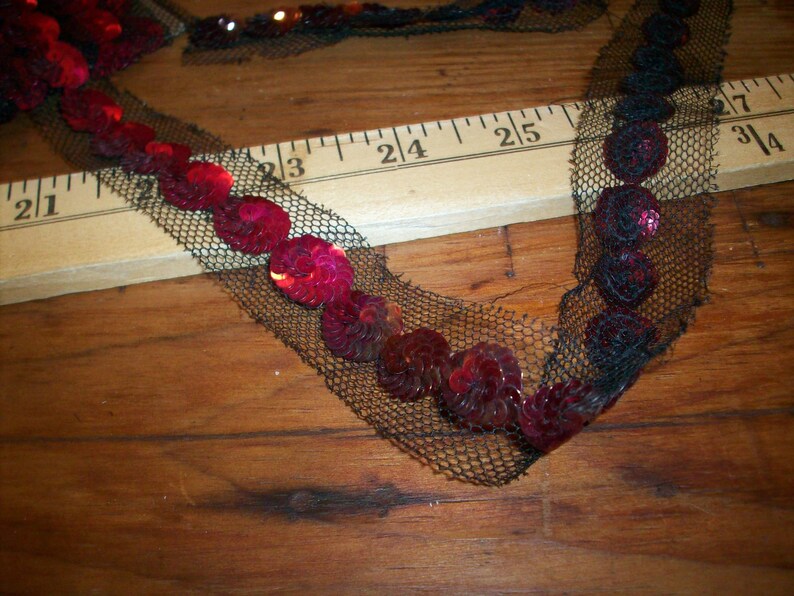 metallic sequins on black silk tulle antique trim
