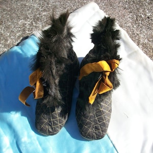 Victorian silk,fur,and cotton baby shoes with leather soles in good condition
