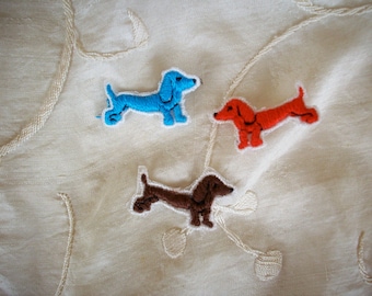 1 dozen Vintage applique of a dachsund dog in a hand loomed applique