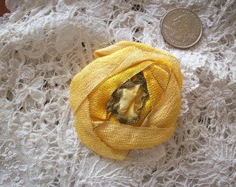 Authentic antique silk ribbon work rose in lemon silk with gold metal