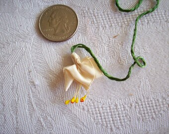 1 ribbonwork flower in vanilla with a green silk stem