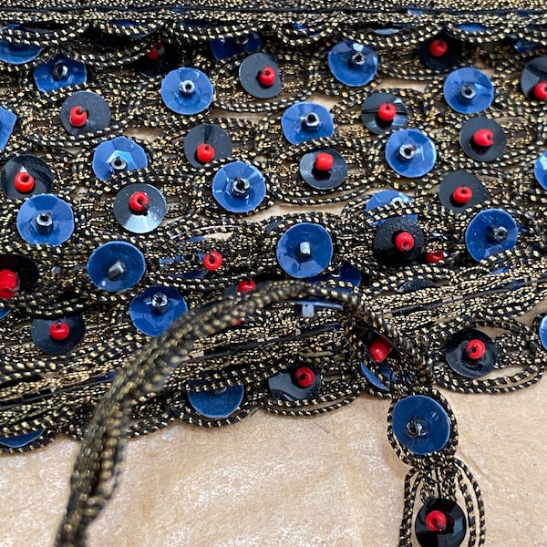 Metallic trim of the 1920s antique authentic with beads and sequins