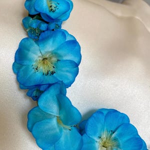 Vintage bloemtakken in turkoois