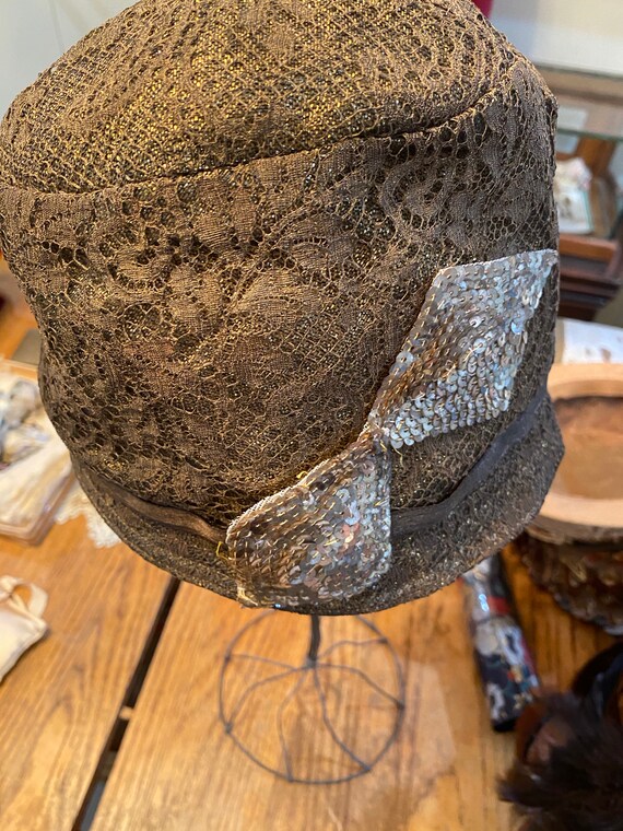 Gold metal lace cloche hat