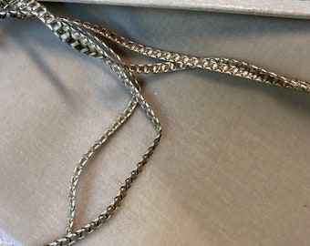 Doll size narrow antique gold trim, made of real metal with silk 1/8" wide