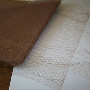 Antique french silk hat veiling in cinnamon stick
