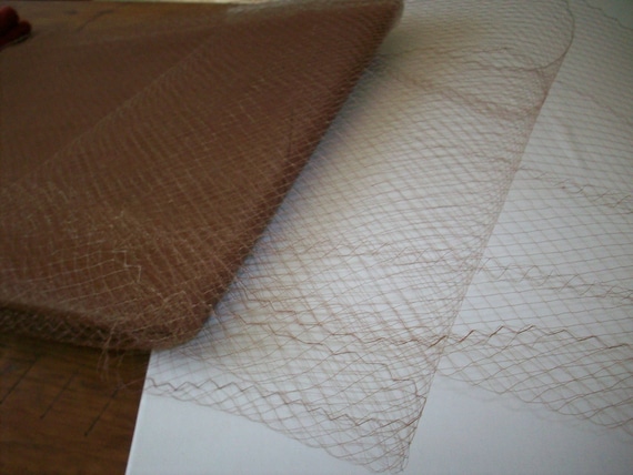 Antique french silk hat veiling in cinnamon stick