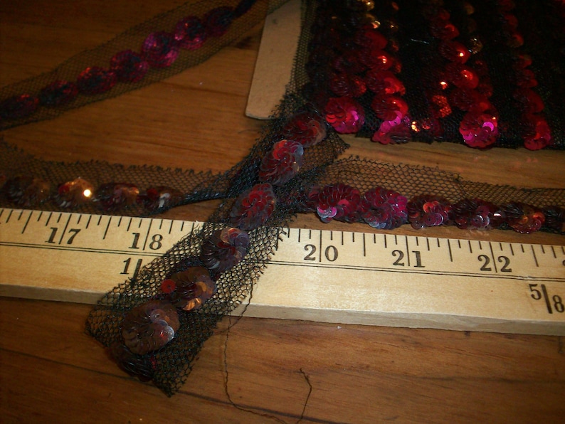 metallic sequins on black silk tulle antique trim