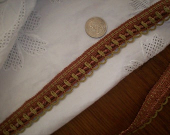 1 yd. of ornate passementerie trim in earth tones/ faded raspberry