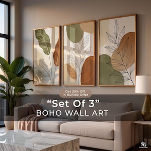 Puede incluir: Juego de 3 l&aacute;minas de arte mural boho enmarcadas. Cada l&aacute;mina presenta ilustraciones bot&aacute;nicas en tonos verdes, marrones y beige, con marcos dorados. El texto "Set Of 3" y "BOHO WALL ART" es visible.