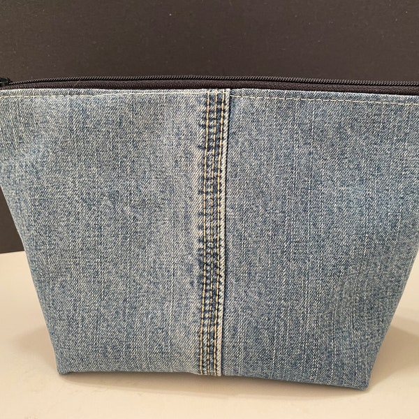 Denim pouch with football lining, up cycled jeans
