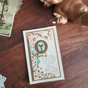 Carte de prière ancienne avec angelots et citation de saint François de Sales