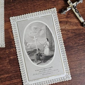 Franse antieke heilige gebedskaart christelijk afscheid met kant gesneden papieren rand.