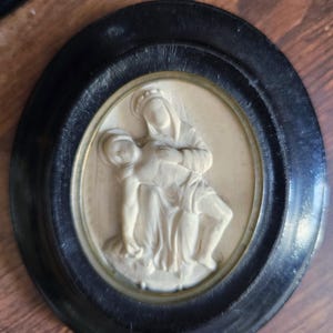 French antique Pieta meerschaum in black oval frame
