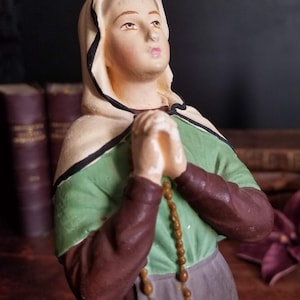 Antique Bernadette Soubirous small painted plaster statue.