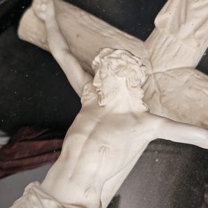 French antique meerschaum crucifix in large wood frame with domed glass.