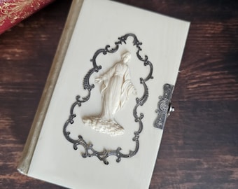 Paroissien romain antique français et latin avec fermoir et Marie en relief