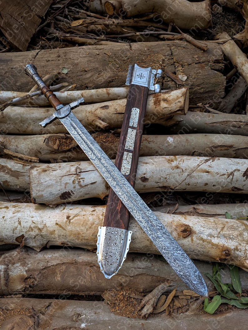 Angled view of a handcrafted Damascus steel Knight Templar Sword with scabbard highlighting detailed craftsmanship