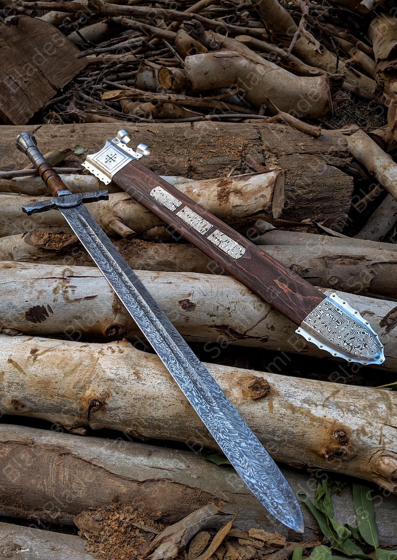 Angled view of a handcrafted Damascus steel Knight Templar Sword with scabbard highlighting detailed craftsmanship